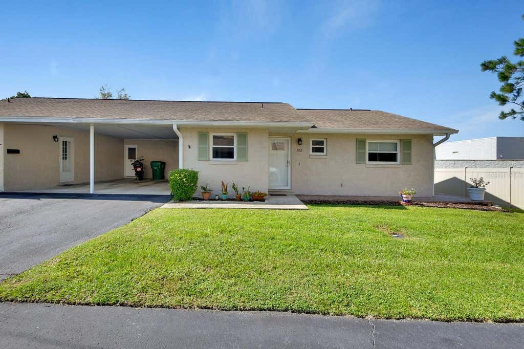 Photo of 202 Elmwood Avenue #330, Deland, FL 32724 (MLS # V4950657)