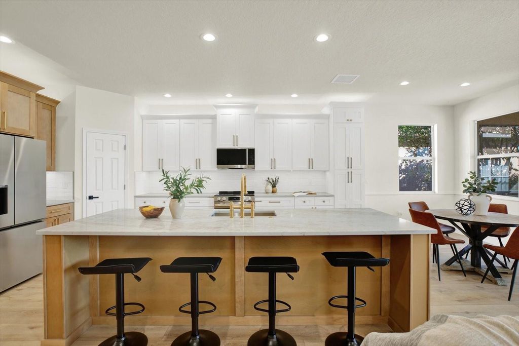 Photo of 23916 Plantation Palms Boulevard, Land O Lakes, FL 34639 (MLS # TB8465175)