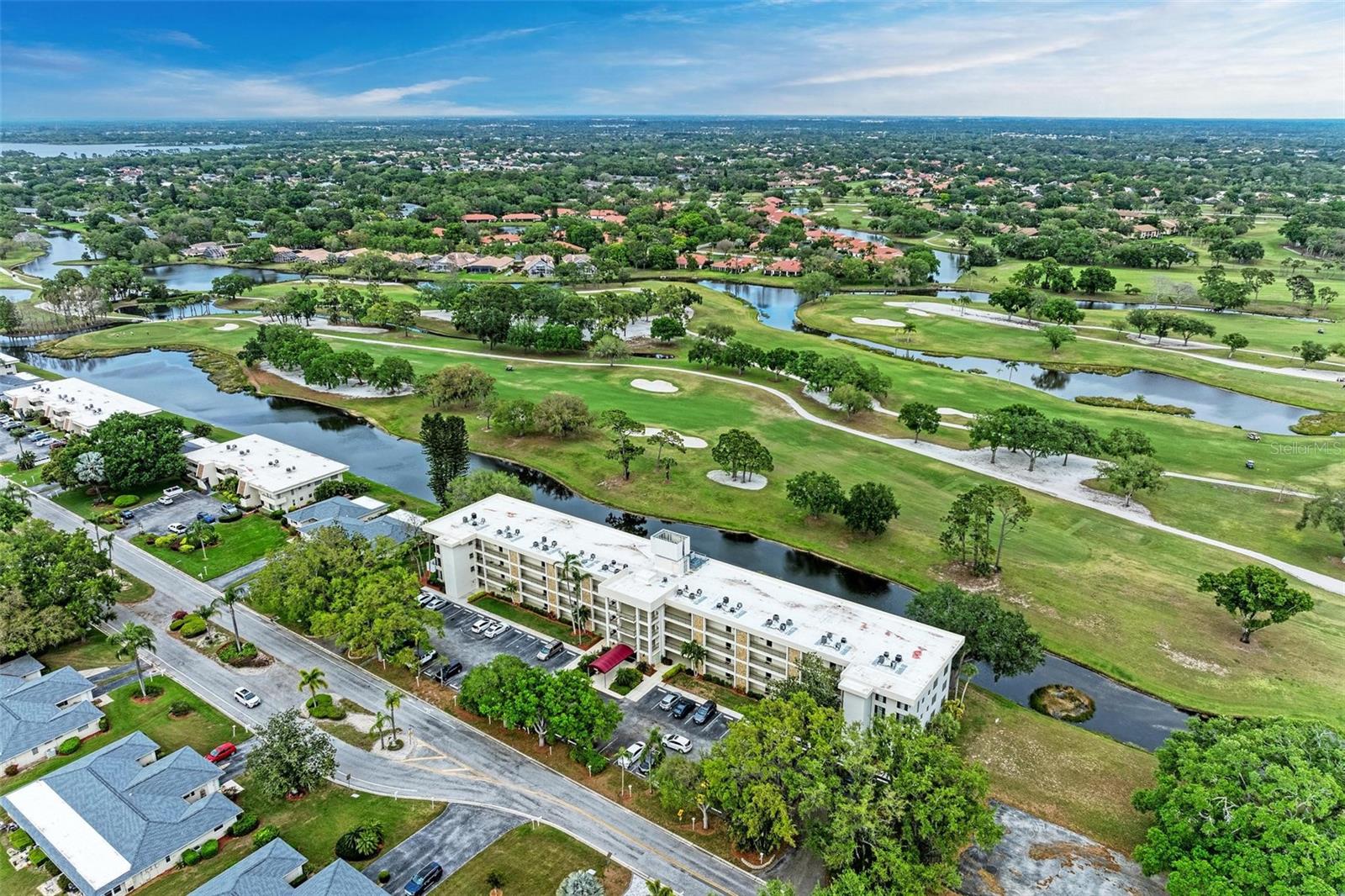 STUNNING RENOVATION of this two bedroom / two bathroom condo available for an ANNUAL FURNISHED LEASE within Palm Aire Golf and Country Club! This home features a new kitchen with sparkling quartz countertops with counter seating, new cabinets, new appliances, new luxury vinyl flooring throughout everything except master. There are two beautiful bathrooms, multiple closets, ample storage and ceiling fans throughout. The main suite features a walk in closet, an oversized closet and a linen closet with a new en suite bathroom as well. The second bedroom also boasts a NEW en suite bath and a double closet space. The lanai has tile flooring, comfortable patio furniture and stunning water and golf course views. This condo is located close to the community pool with a club room, shuffleboard and fitness room. Additionally you can join Palm Aire Country Club. Optional memberships at the club are available for seasonal or annual. Palm Aire feature 36 holes of championship golf, tennis, pickleball, fitness, dinning and many clubs / groups. The villa is right in the heart of the University shopping, UTC mall, dining, recreation and entertainment districts.
