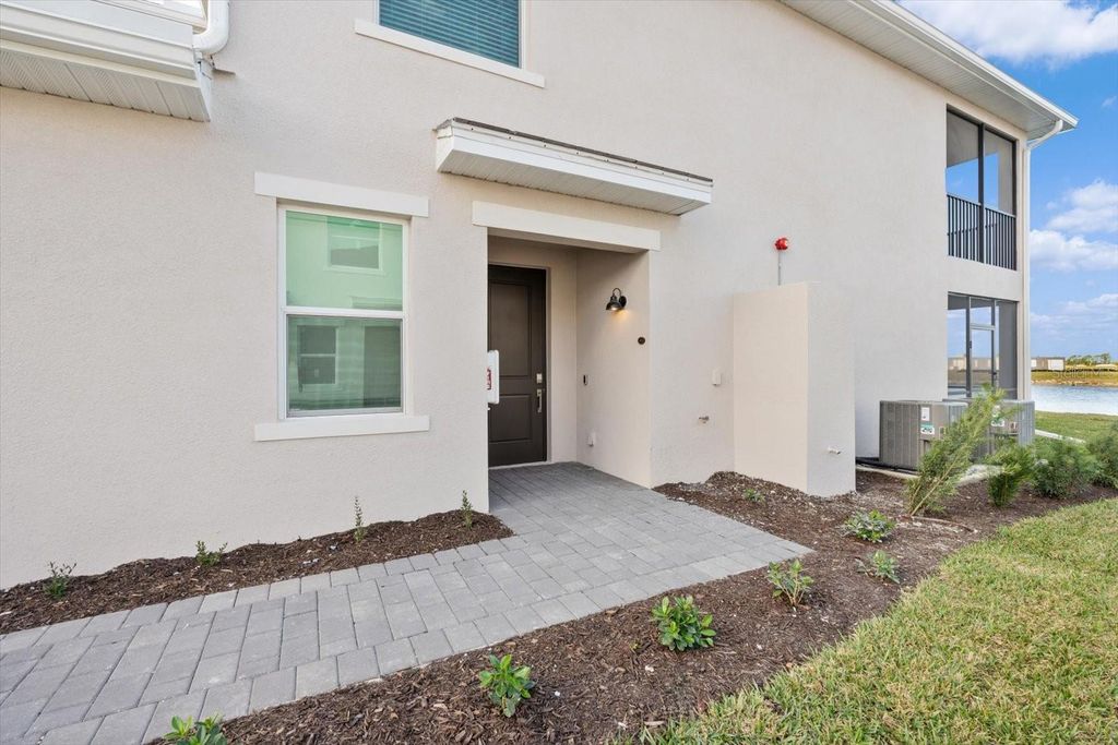 Photo of 17585 Boracay Court #2-102, Venice, FL 34293 (MLS # A4681931)