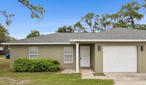 Photo of 1105 N Rockingham Avenue, Tavares, FL 32778 (MLS # O6416337)