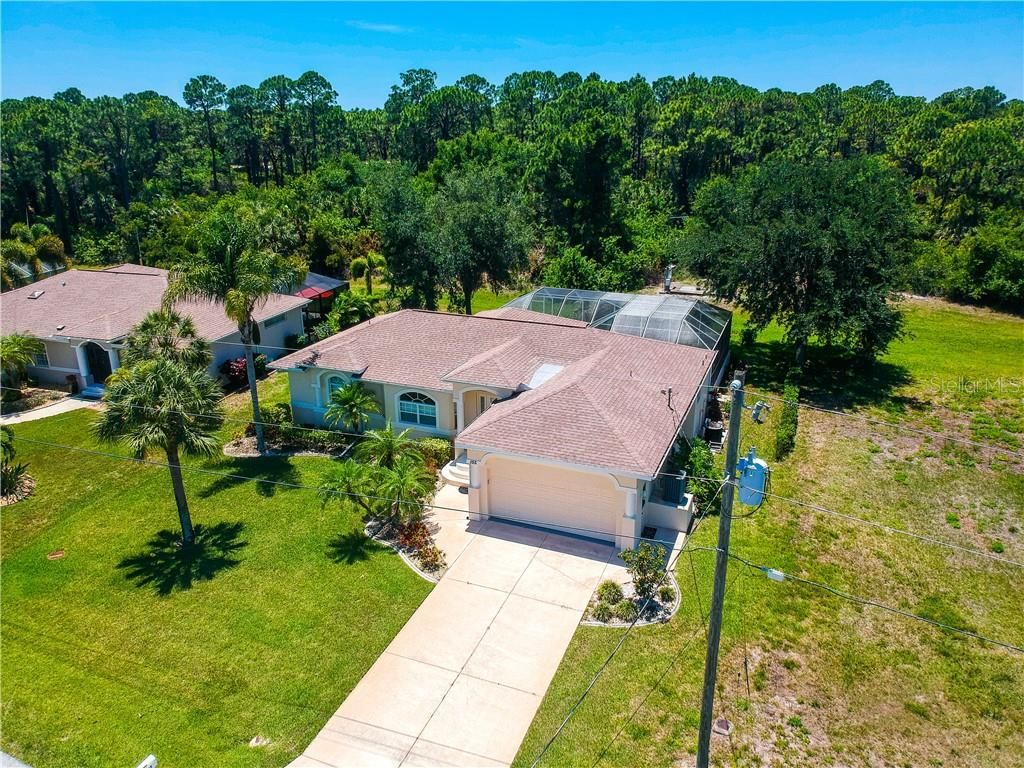 Photo of 155 Long Meadow Lane, Rotonda West, FL 33947 (MLS # C7428070)