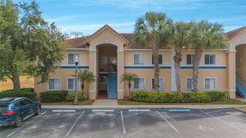 Photo of 522 Villa Del Sol Circle #102, Orlando, FL 32824 (MLS # O6376259)