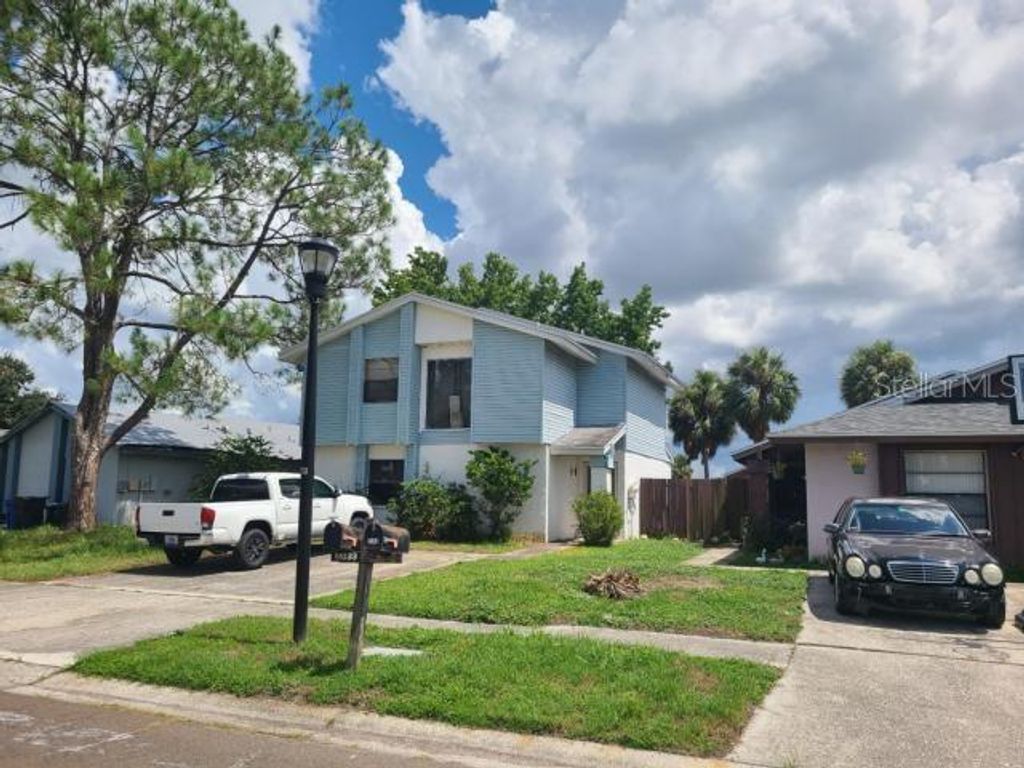 Photo of 11033 Springridge Drive, Tampa, FL 33624 (MLS # TB8441544)