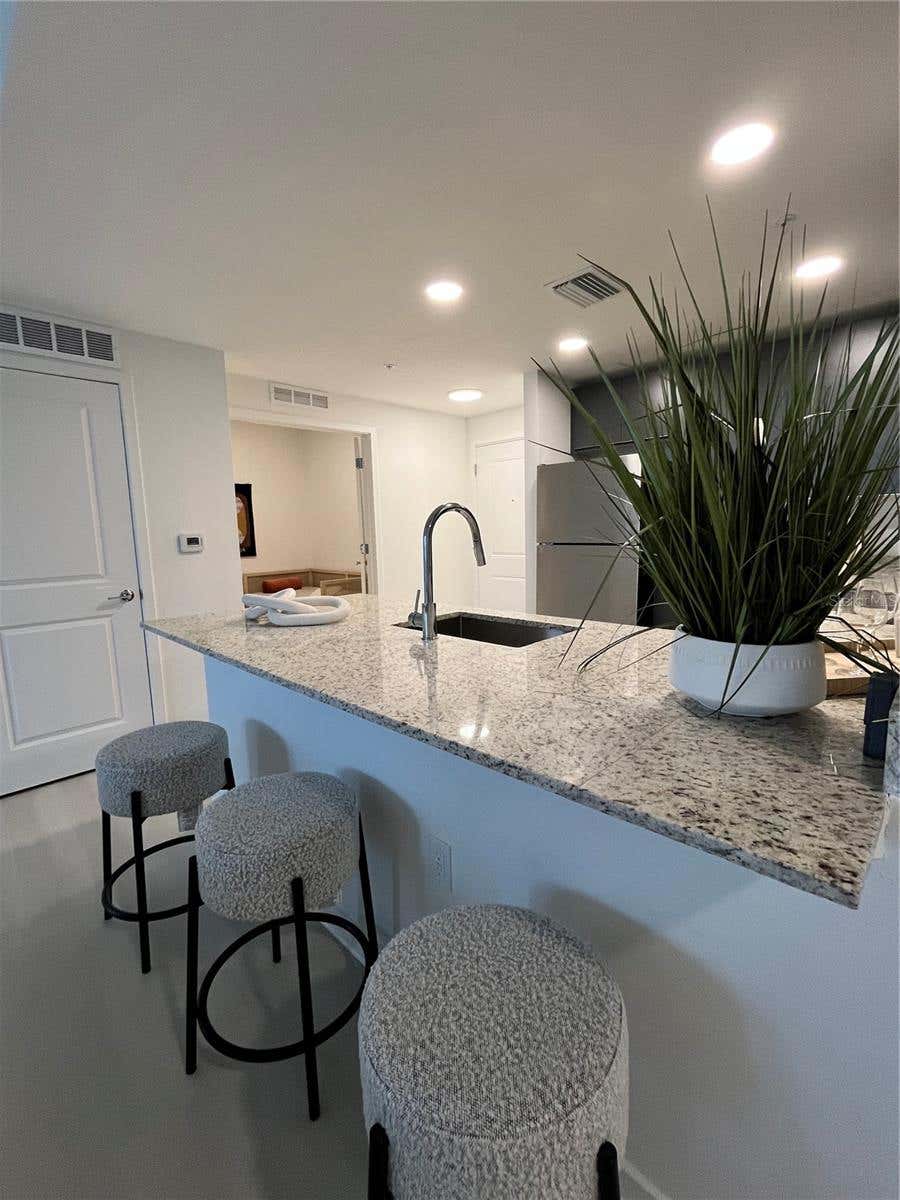 Photo of 5563 Millenia Park Blvd #209, Orlando, FL 32839 (MLS # O6436107)