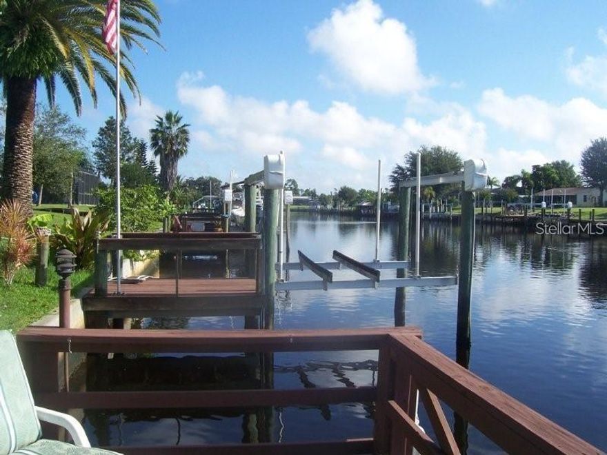 Fantastic 3 bedroom 2 bath waterfront home with quick access and a pool! This home has an added feature of a large sunroom on the way out to the private pool area. Lots of Kitchen storage, tile in all living and traffic areas, circular driveway, beautiful vegetation and more. Come see this one today.