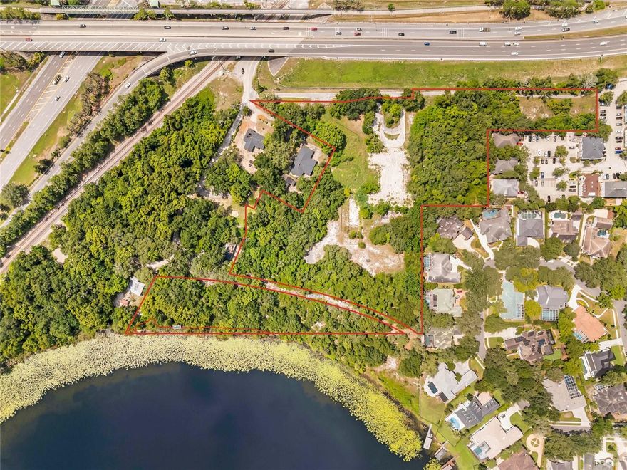 Exceptional opportunity for commercial developers, residential builders, or those seeking a private estate within the City of Maitland, Orange County. This rare offering includes approximately ±8 acres of usable land comprising multiple contiguous parcels and rights-of-way. The property is designated as a Traditional Neighborhood and zoned RS-2.

A previously submitted Planned Development application proposed a gated community with 28 single-family homes—featuring 13 conjoined duplex-style units and 9 lakeview single-family lots. A future buyer may choose to revive or revise this plan, offering a valuable head start on entitlements.

This flexible property supports a variety of development options and may be subdivided for separate sale, presenting multiple investment paths. As one of the last remaining large infill tracts in the area, it offers approximately 766 feet of direct frontage on Lake Seminary.

Don't miss this rare chance to acquire a high-potential property in a sought-after location.