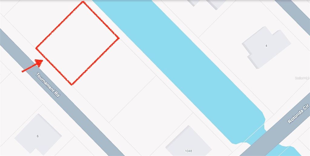 Photo of 7 Tournament Road, Rotonda West, FL 33947 (MLS # O6382084)