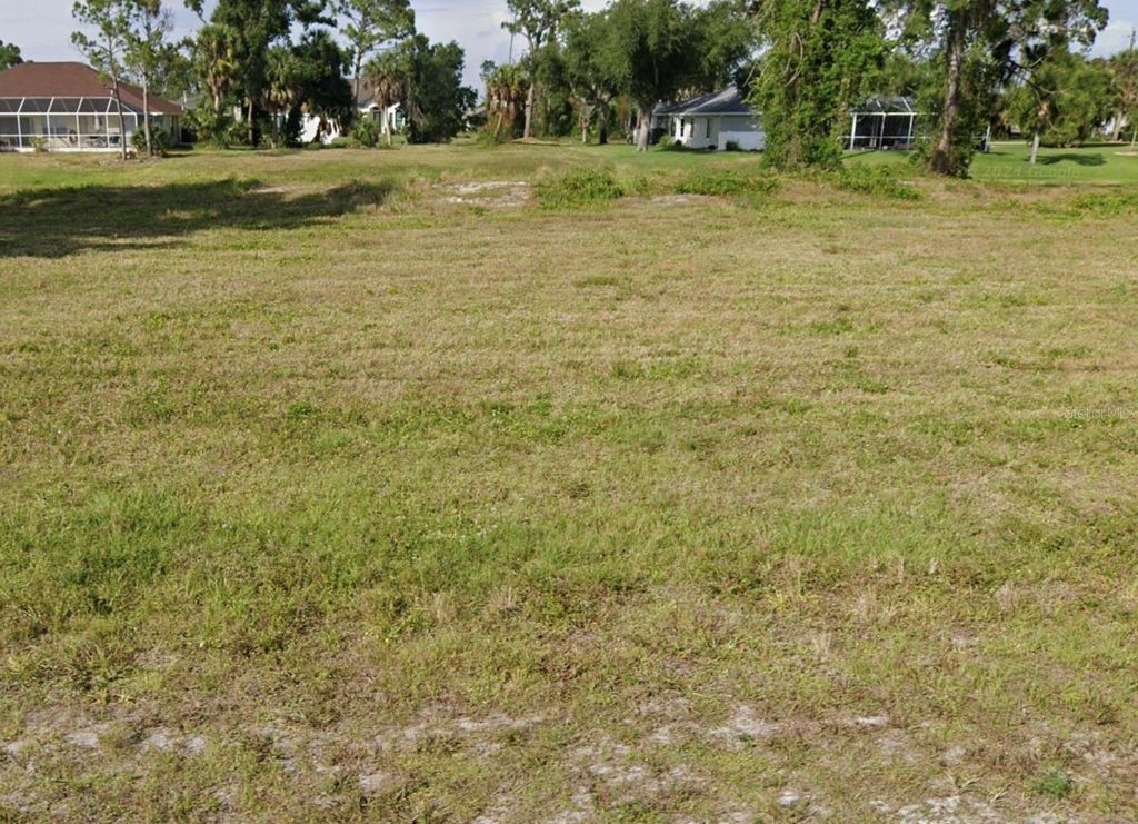 Photo of 7 Tournament Road, Rotonda West, FL 33947 (MLS # O6382084)