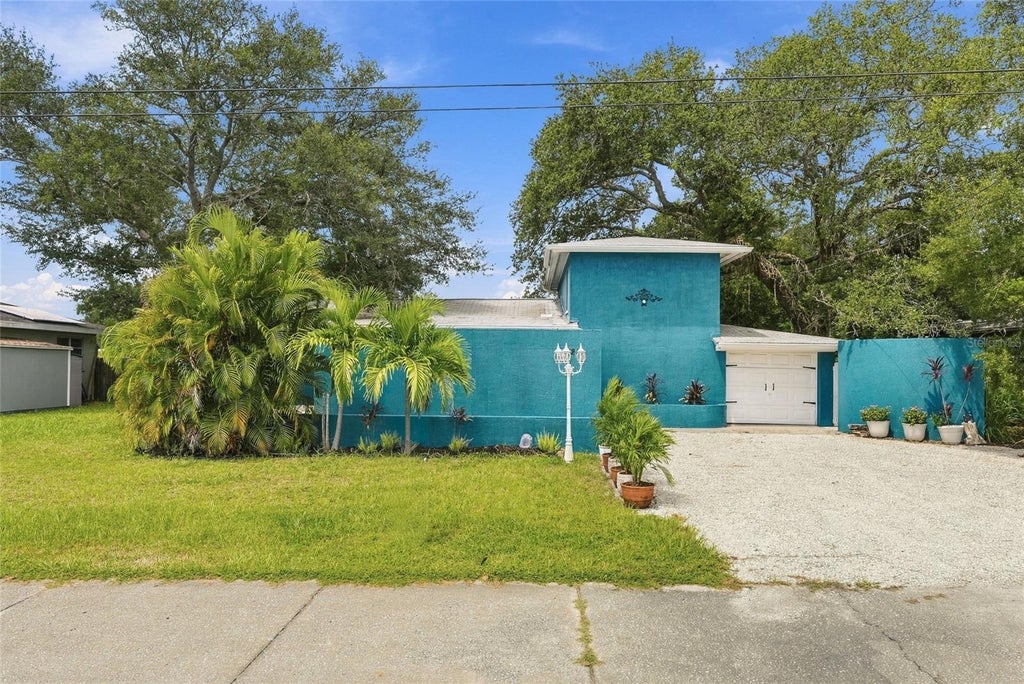 Photo of 4720 Welch Causeway, St Petersburg, FL 33708 (MLS # TB8506335)