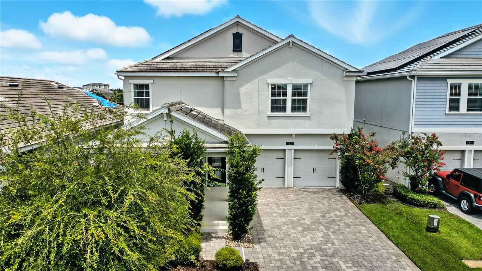 Stunning Two-Story Home in Storey Park
Welcome to 11837 Imaginary Way, a beautifully designed two-story residence located in the highly desirable Storey Park community of Lake Nona. This modern home boasts 5 spacious bedrooms, 3 bathrooms, and a 3-car garage, perfectly blending style, comfort, and functionality.
From the moment you arrive, you’ll notice the home’s inviting paver driveway, manicured landscaping, and clean architectural lines. Step inside to find an open-concept floor plan with abundant natural light, neutral tones, and high ceilings that create a bright and airy atmosphere.
The gourmet kitchen features Quartz countertops, stainless steel appliances, ample cabinetry, and a large island perfect for entertaining. The adjoining dining and living areas provide a seamless flow for gatherings with family and friends.
Upstairs, the generously sized primary suite offers a peaceful retreat with a walk-in closet and a luxurious en-suite bathroom featuring dual vanities and a glass-enclosed shower. Additional bedrooms are versatile and ideal for family, guests, or a home office.
Step outside to a stunning private enclosed pool overlooking the pond, complete with sun shelf —perfect for relaxing or enjoying the Florida sunshine with friends and family.
As part of Storey Park, residents enjoy resort-style amenities including a community clubhouse, fitness center, swimming pools, playgrounds, and walking trails. Conveniently located near major highways, shopping, dining, and Lake Nona’s Medical City, this home offers both tranquility and accessibility.