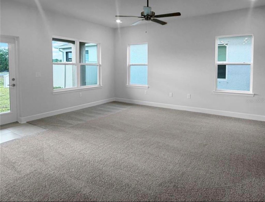 Photo of 7643 Bent Tree Loop, Saint Cloud, FL 34771 (MLS # O6384594)