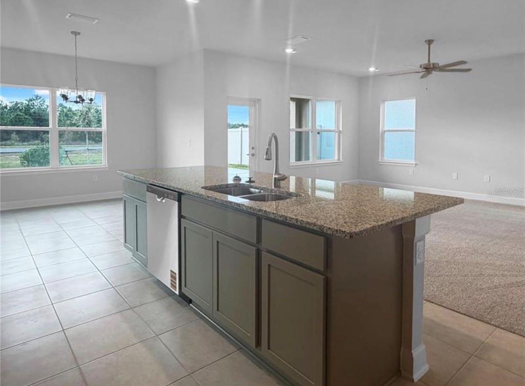 Photo of 7643 Bent Tree Loop, Saint Cloud, FL 34771 (MLS # O6384594)