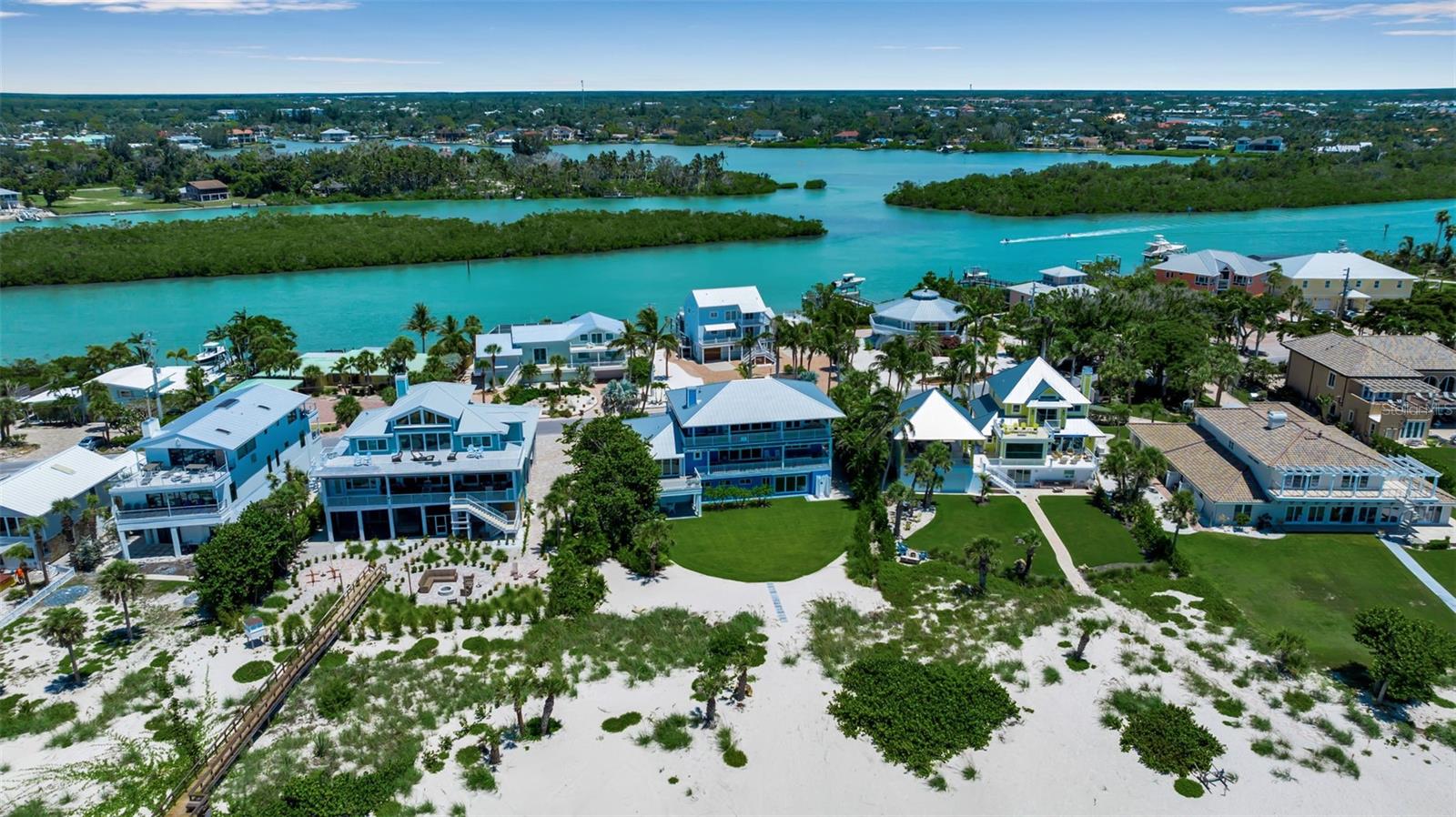 Welcome to "Toes in the Sand" Modern beach house with all the bells and whistles, move in ready 3+ bedroom 6 baths 4 car garage approximately 4000 sq ft
1.174 acres on Gulf of America at 506 S. Casey Key Road
Stunning selections of the most innovative advances in homes design and function were made in 2020 making this home look and feel like new construction. Outfitted with the finest selection of Wolf range and GE Café appliances, designer selected lighting and elegant finishes, perfect for a retreat to the beach. All bedrooms feature en-suite bathrooms with zero entry showers and motion activated lighting in closets and baths. All new windows and doors. New Roof in 2024. Taking open concept to the extreme with motorized automation that opens the pocket sliding doors and kitchen window. Use Smart home technology with motorized screen doors and retractable awnings maximizing the indoor/outdoor living experience. Rare 4 car garage for the automobile enthusiast with plenty of space to store the golf cart, paddleboards and kayaks, and beach accessories. There is Deeded access to the Intercoastal Waterway extremely close to the North Venice Inlet by way of a walking and boat docking easement across street and the best neighbors you could ask for. An elevated pool was permitted, inground optional, rendering upon request. Located on one of the few sections of the Florida Coastline that experiences self re-nourishing beach and that does not require steps or crossing rocks to access the beach. Furnishings and golf cart negotiable. Call for links to video, and 3D floorplan virtual reality tours.