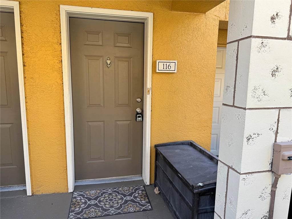 Photo of 6131 Metrowest Boulevard #116, Orlando, FL 32835 (MLS # O6440274)