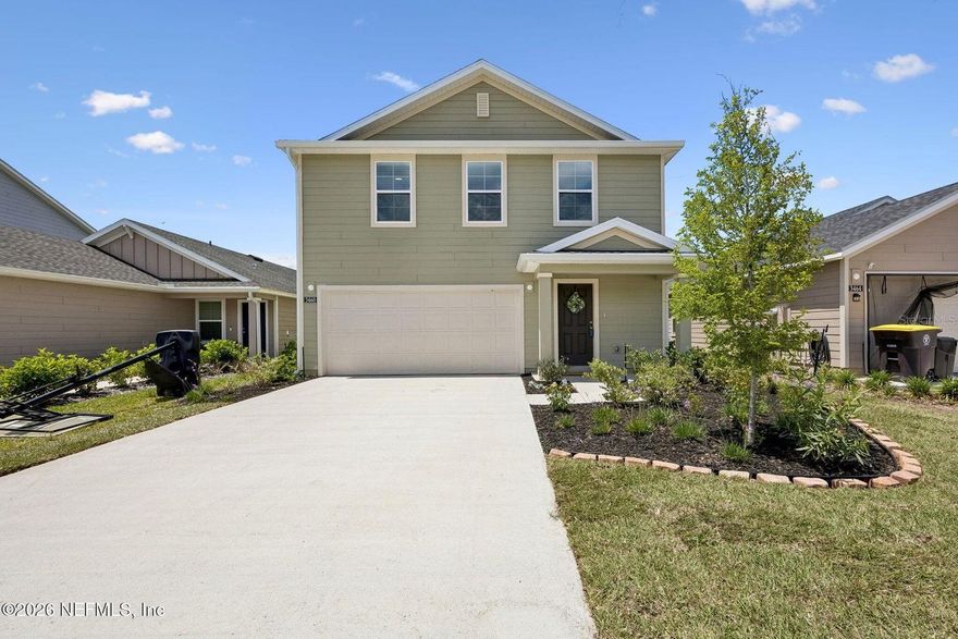 Welcome to this beautifully maintained newer construction Lennar home in the desirable Kings Landing community! This spacious home features an open-concept layout with a bright & airy living area that flows seamlessly into the kitchen and dining space, perfect for both everyday living and entertaining. The modern kitchen offers stylish finishes, ample cabinet storage & a large island with additional seating. Enjoy peaceful lake views from your backyard and living spaces, creating the perfect setting to relax & unwind. The primary suite provides a private retreat with a walk-in closet & en-suite bath, while the additional bedrooms and loft offr flexibility for use. The backyard offers plenty of room to relax, play, or create your own outdoor oasis while taking in the water views. Conveniently located near I-295, shopping, dining, and everyday conveniences, this move-in ready Lennar home combines comfort, functionality, and scenic waterfront living. Don't miss this opportunity !