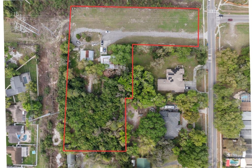 Photo of 6890 County Road 95, Palm Harbor, FL 34684 (MLS # TB8488562)