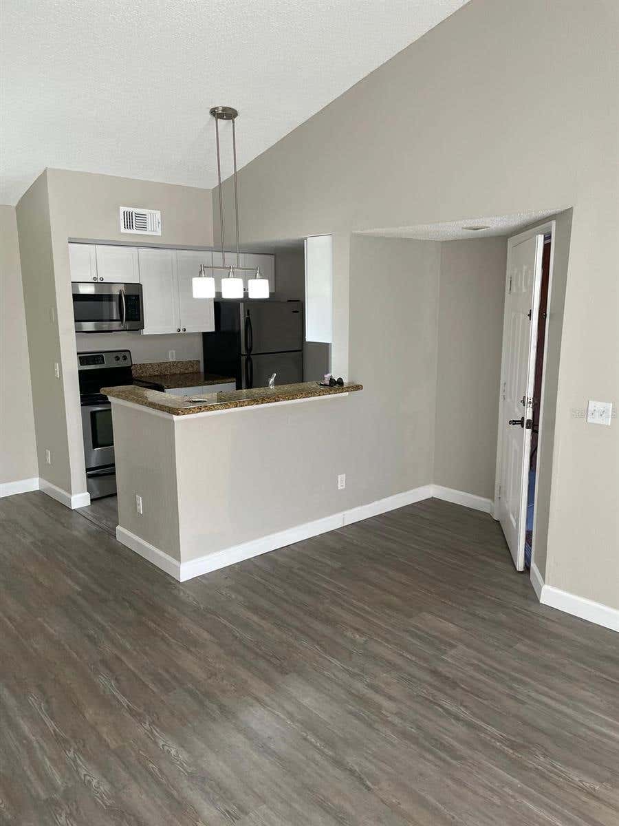 Photo of 5140 Conroy Road #35, Orlando, FL 32811 (MLS # O6429100)