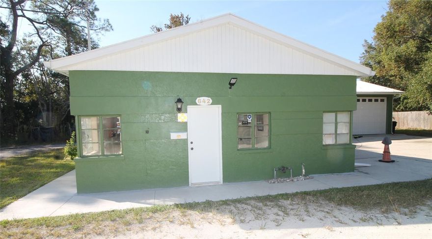 Prime C-1 Commercial Space on State Road 50 – High Visibility & Excellent Access

Outstanding opportunity to lease a flexible office and 3-bay garage/shop space located directly on State Road 50, the main East-West corridor across Central Florida. This freshly painted facility features a 3-bay shop measuring 26' x 41' with 12-ft-wide bay doors and a minimum 9-ft ceiling height, providing functional space for storage, light commercial, or service-based operations (excluding auto repair).
The property is located on the Lake Xpress bus route. Lake Xpress interfaces with metro Orlando's Lynxx mass transit system.
The 24' x 36' air-conditioned office/back-shop area offers comfortable workspace, reception, or operations support with plenty of versatility.

Positioned just minutes from US Highway 27 and the Florida Turnpike, the property also provides a direct connection to Lakeland via State Road 33, a major gateway to Interstate 4 and the Tampa Bay distribution corridor.

High traffic counts, strong visibility, and easy access make this location ideal for professional services, trades, small-scale commercial operations, or businesses seeking strategic placement on one of Central Florida’s most traveled routes.

Note: This location is not suitable for a used car lot or auto repair shop.