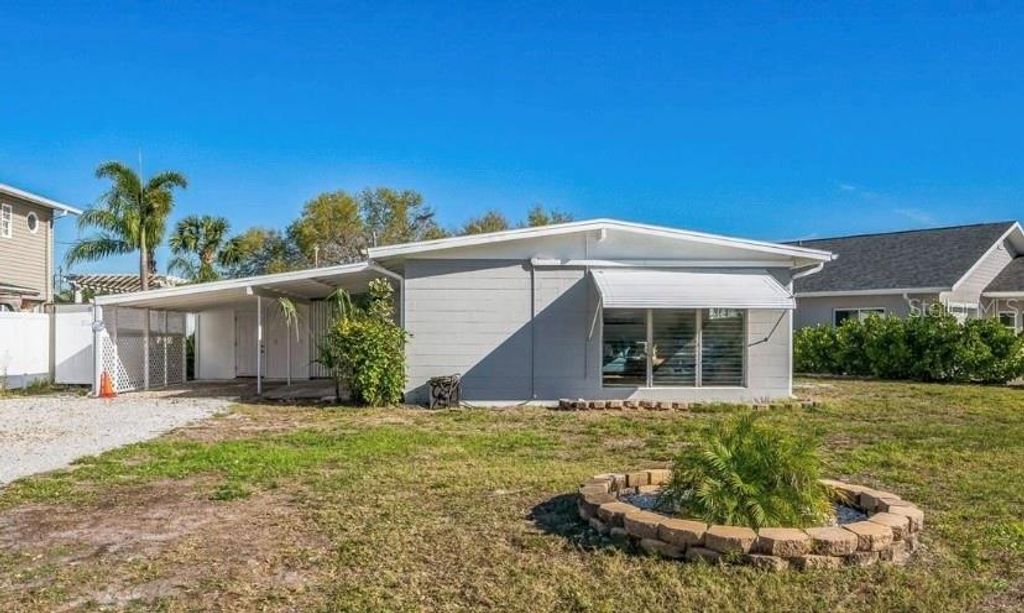 Photo of 101 Sunlit Cove Drive NE, St Petersburg, FL 33702 (MLS # TB8477272)