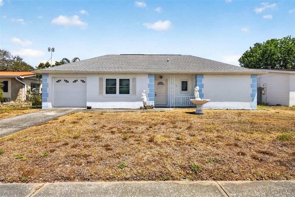 Photo of 8327 Moulton Drive, Port Richey, FL 34668 (MLS # W7885457)