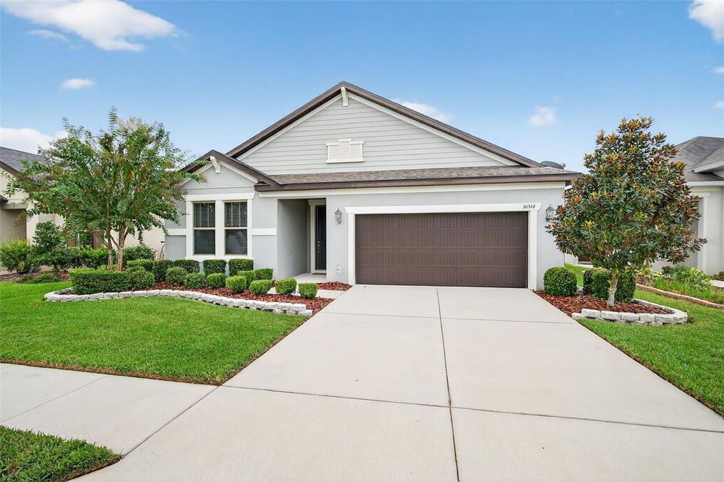 Photo of 30514 Pecan Valley Loop, Wesley Chapel, FL 33543 (MLS # TB8426213)
