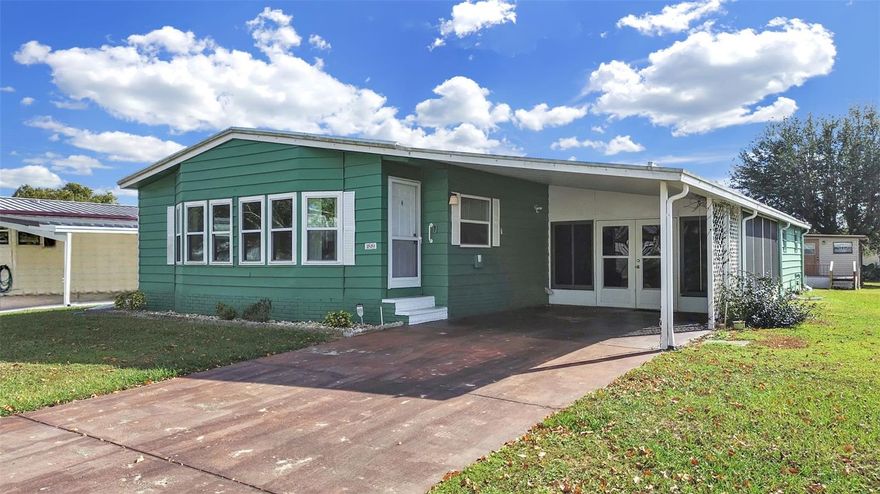 WOW, THIS HOME IS PRICED TO SELL!!  VERY spacious, 2 bedroom 2 bathroom home in this 55+ community of Foxwood Lake Estates where you OWN THE LAND!  Over 1500 square feet of living space with an oversized Florida room, huge shed and the furniture conveys with the sale!  The laminate flooring in newer, the metal roof over was installed in 2014 and the water heater is brand new!!  This home affords the opportunity to make it your own with your design!  Sunshine awaits and there are lots of things to do in this active community, come and tour the large clubhouse, game room, billiards room, sauna, fitness center, library, large heated pool, hot tub, pickle ball court, shuffle board courts, bocce ball courts, basketball hoop, paved walking path around the lake and so much more!! Lots of events happening here like pot-luck dinners, entertainment series, dances, Wednesday morning coffee, raffles, bingo, zumba, pilates, line dancing lessons, pool aerobics, golf cart parades and many holiday celebrations! Schedule your showing today!