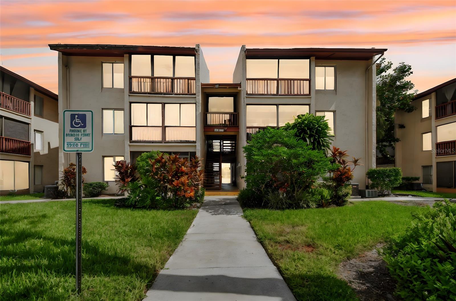 Experience relaxed, convenient living in this charming and tastefully refreshed condo in a gated community. Brand new carpet, new paint, granite countertops, updated cabinetry, in-unit laundry, and stainless appliances--make this home completely MOVE IN ready! The open concept floor plan provides a nice flow from the kitchen to the living room, with a granite top peninsula in between. Plenty of light comes through the large sliding glass doors and allows for a serene view of the pond and pool, and leads you out to a large screened private porch. Conveniently located near Raymond James Stadium, close to International Mall, 15 minutes from Tampa International Airport, and 20 minutes from downtown Tampa, this location is unbeatable!