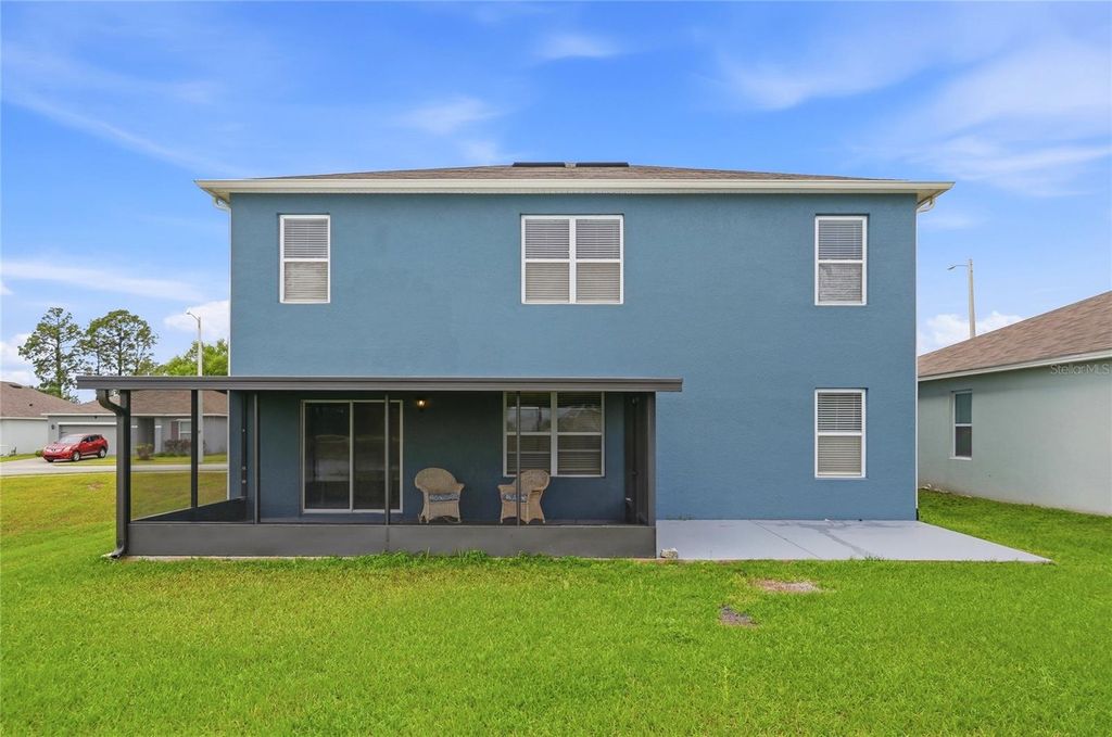 Photo of 416 Corso Loop, Winter Haven, FL 33884 (MLS # P4938389)