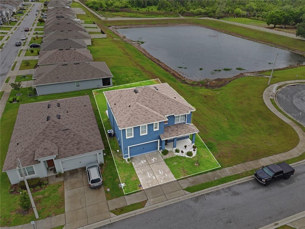 Photo of 416 Corso Loop, Winter Haven, FL 33884 (MLS # P4938389)