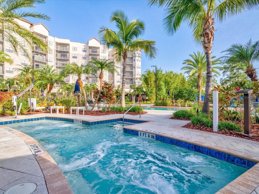 Looking for a Vacation Home in Orlando, this unit is a rare find with the Best Views in the Resort! This stunning 7th-floor condo at The Grove Resort & Spa offers breathtaking water views and front-row unobstructed seats to Disney fireworks reflecting over the lake each night. This fully furnished, all-inclusive condo-hotel provides a truly hands-off investment opportunity with onsite property management and a full-service rental program. Located in Building 1, this luxury 3-bedroom, 2-bath unit is perfectly situated just steps from restaurants, pool and resort amenities. Features an open floor plan with modern furnishings and all necessary housewares. The spacious primary suite includes a king bed, while both guest bedrooms have queen beds for comfortable guest accommodations. The fully equipped kitchen features stainless steel appliances, including refrigerator, range, microwave, and dishwasher. A private laundry closet with washer and dryer adds convenience for guests. Owners and guests alike will enjoy relaxing on the private screened balcony overlooking the water.The Grove Resort has exceptional amenities including multiple resort pools, Surfari Surf Park, Lake Austin with fishing dock and paddleboats, Escape Spa, fitness center, on-site restaurants, sundry shop, arcade, and youth activity center. Ideally located just minutes from Walt Disney
