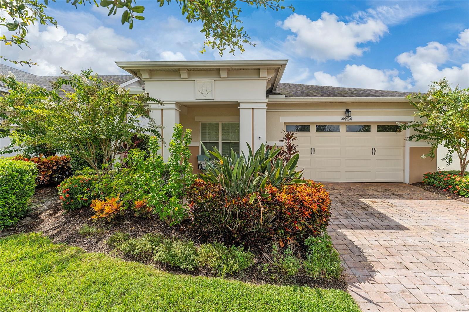 This 3-bedroom 3 bath home has all you need to live that luxurious lifestyle in a master planned 55+ active adult resort style community. As you step into to spacious foyer, you will see an open kitchen with 15 ft. stone island, open living-dining room and full-length glass sliding doors that lead onto a covered screened in lanai complete with custom outdoor kitchen, spa hot tub and privacy hedges. This home also features a fully fenced in back yard and is an extension of the lanai. The Master suite and other 2 bedrooms have carpet; a large on suite bathroom with walk in shower and shower seat, an oversized walk-in closet with custom floor to ceiling shelving where no space is wasted. The 2nd bedroom also has its own on suite bathroom with Walk-in closet and custom floor to ceiling shelving. And an office with built in cabinets, bench, bookshelves and a large desk that can accommodate 2 workstations. The 10' ceiling & open floor plan is full of possibilities with flexible layout, a large walk-in pantry with custom shelving. The gourmet kitchen features a gas cooktop, plenty of pull-out cabinets and additional storage space. The community features a 20,000 sq ft clubhouse, resort style pool, lap pool and much more.
Lawn care, exterior water and electricity with a small fee is included in the rent. Solar panels are included