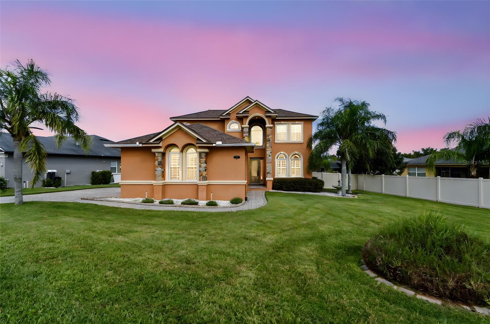 Welcome to your dream home in The sought after gated community of Morgan Creek Preserve, on the desirable south side! This exquisite custom-built residence by Hulbert Homes. This Formal Model Home is ready for you to call it your own.
Spanning an impressive 2,785 sq ft in heated area with a grand total of 3,713 sq ft under roof. This luxurious 4-bedroom, 3.5-bathroom formal MODEL HOME with a side-entry garage and a brick pavered driveway, offers an unparalleled living experience. Enjoy the convenience of two master suites on the main floor, perfect for families and guests. The gourmet kitchen is a chef’s delight, featuring granite countertops, top-of-the-line stainless steel appliances, and elegant stacked dark wood cabinetry, Formal living room, formal dining room, plus great room & breakfast nook. topped off with tray ceilings & crown molding throughout.
Retreat to the master suite complete with his and her walk-in closets and a spa-like en-suite bathroom, boasting dual sinks, a garden tub, and a spacious walk-in shower. The home showcases designer finishes, plantation shutters, and stylish custom lighting, enhancing its charm.
Step outside to a large screened and pavered lanai, overlooking a beautifully fenced in landscaped yard equipped with an irrigation system. Ideal for entertaining and enjoying peaceful mornings.
With formal living, dining, and family rooms, this home perfectly blends comfort and elegance. The upstairs movie theater, complete with state-of-the-art projection equipment and surround sound, doubles as a cozy fourth bedroom.
NEW ROOF and AC replaced in 2022.This gated community is beautifully maintained and provides access to the pool, clubhouse, basketball court, tennis court, including a lot designed for boat or RV storage. Brand new shopping center and Publix within five minutes of the community.
Charge your EV in YOUR OWN GARAGE! Level 2 Charging.
Don’t miss the chance to live in luxury—schedule your showing today!