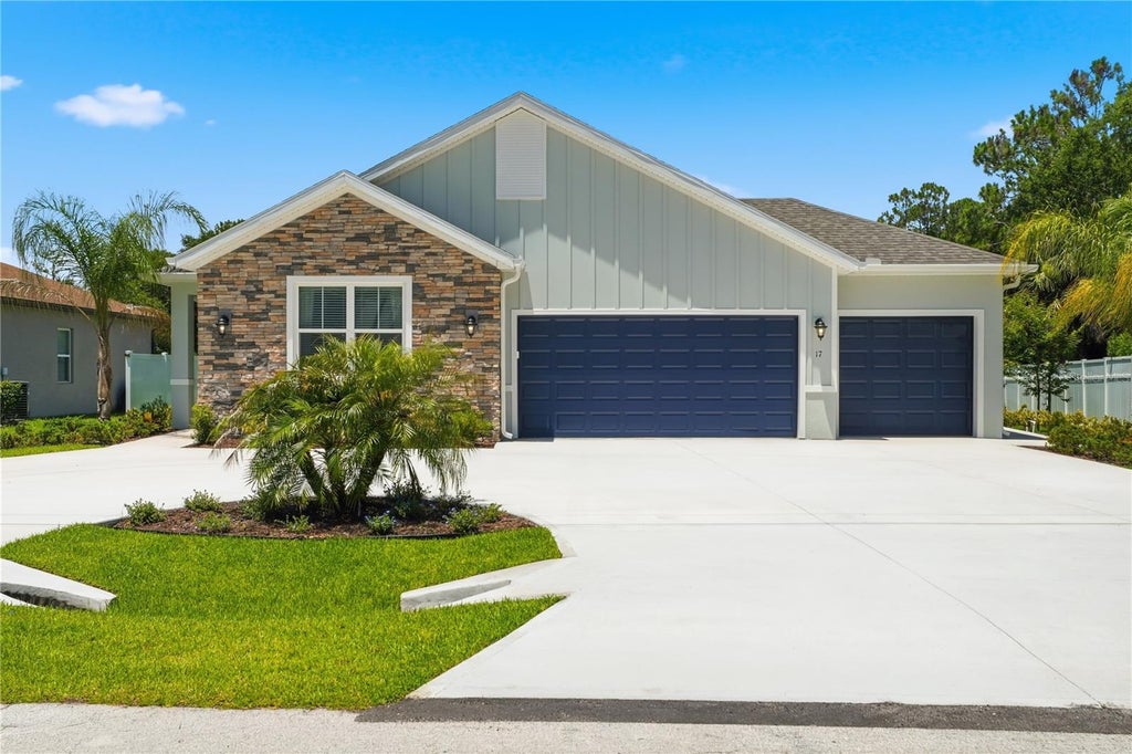 Photo of 61 La Mancha Drive, Palm Coast, FL 32164 (MLS # O6449130)