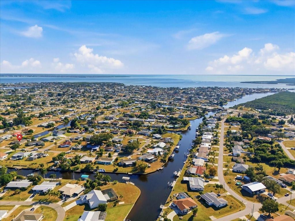 Photo of 119 Easton Drive NW, Port Charlotte, FL 33952 (MLS # C7517826)