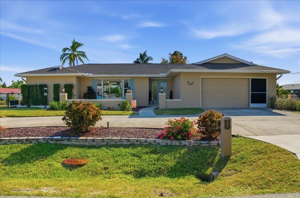 Photo of 119 Easton Drive NW, Port Charlotte, FL 33952 (MLS # C7517826)