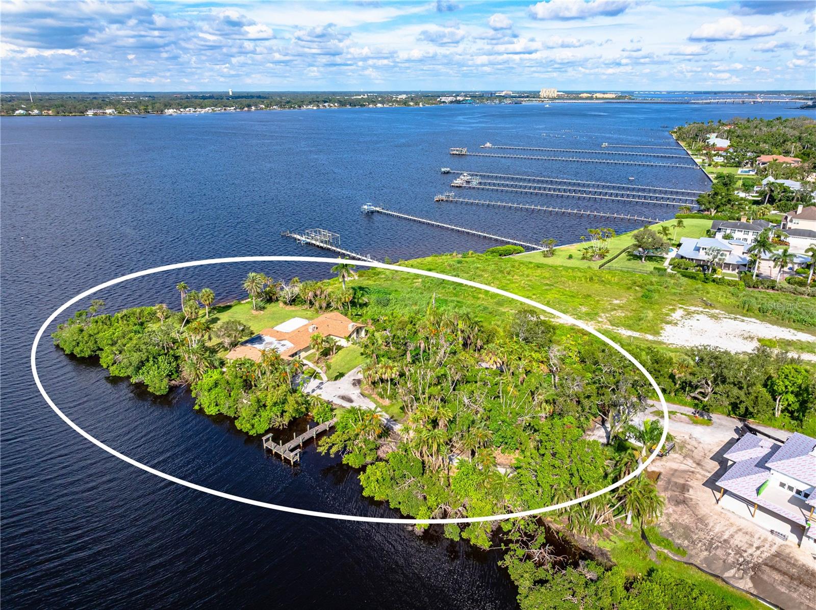 Discover the unparalleled charm of Bradenton’s coveted Manatee Riverfront with this exceptional property offering 1.34 acres of prime land. Positioned on the corner of the Manatee River and Mclewis Bayou, this unique homesite combines wide, unobstructed water views framed by palm trees, with over 300 feet of water frontage, and boatable water in a location that truly defines “Location, Location, Location."
For boating enthusiasts, this property offers direct access to the Manatee River, and Gulf of Mexico with no bridge restrictions—a rare advantage for waterfront living, especially on such a large and private lot.
Please note: the existing residence was storm-damaged and is currently uninhabitable. This sale is being offered for land value only, presenting a remarkable opportunity to design and build your own custom waterfront estate tailored to your vision.