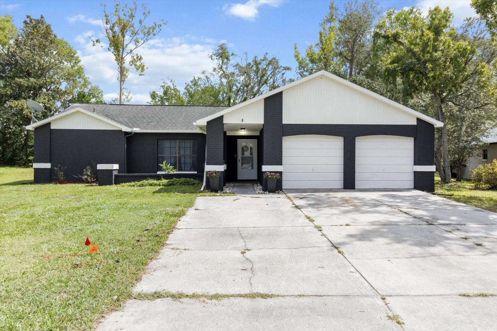 Welcome to this spacious 3-bedroom, 2-bathroom home featuring 1,632 square feet of comfortable living space. Built in 1985, this well-maintained property offers a thoughtful layout with a separate living room and family room, providing flexibility for everyday living.
The enclosed back porch adds an additional 432 square feet of usable space and is already wired for a hot tub—perfect for creating your own private retreat or extending your entertaining area. Step outside to the open deck in the backyard, ideal for barbecues, gatherings, or simply enjoying the Florida sunshine.
The kitchen is equipped with sleek stainless-steel appliances, and the convenience of an interior laundry room adds to the home's practical appeal. A two-car garage offers ample parking and storage.
Located just off US-19, this home provides easy access to major roadways and is close to plenty of shopping, dining, and everyday amenities.
Don't miss your chance to own this move-in ready home!