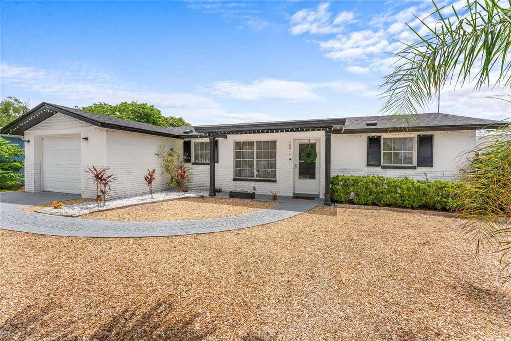 Photo of 10914 Oakdale Avenue, Port Richey, FL 34668 (MLS # A4698057)
