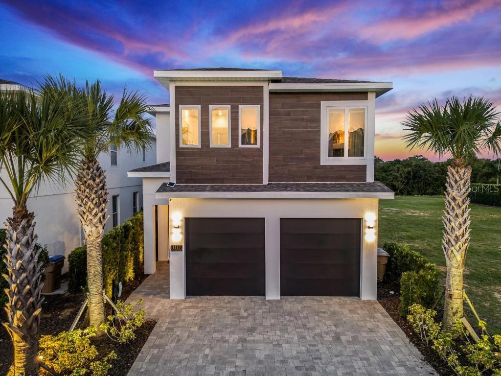 Experience luxury living in the world-renowned Reunion Resort with this stunning 6-bedroom, 5.5-bathroom home offering 3,428 sq. ft. of fully furnished space. Built in 2021, this property combines modern design with exceptional comfort, making it an ideal primary residence, second home, or investment property.
Inside, you’ll find a beautifully designed kitchen featuring stainless steel appliances and a coffee bar with an under-counter fridge. The converted garage adds 395 sq. ft. of fun, transformed into a Star Wars–themed game room.
The home boasts two primary suites—one on the first floor with a walk-in closet and spa-like en-suite bath, and another upstairs with a private balcony, soaking tub, and walk-in shower. Additional themed bedrooms with en-suites and bunk beds provide the perfect retreat for guests.
Step outside to a covered lanai designed for entertainment, complete with an outdoor dining area, wet bar, and under-counter fridge—all just minutes from Orlando’s world-famous attractions.