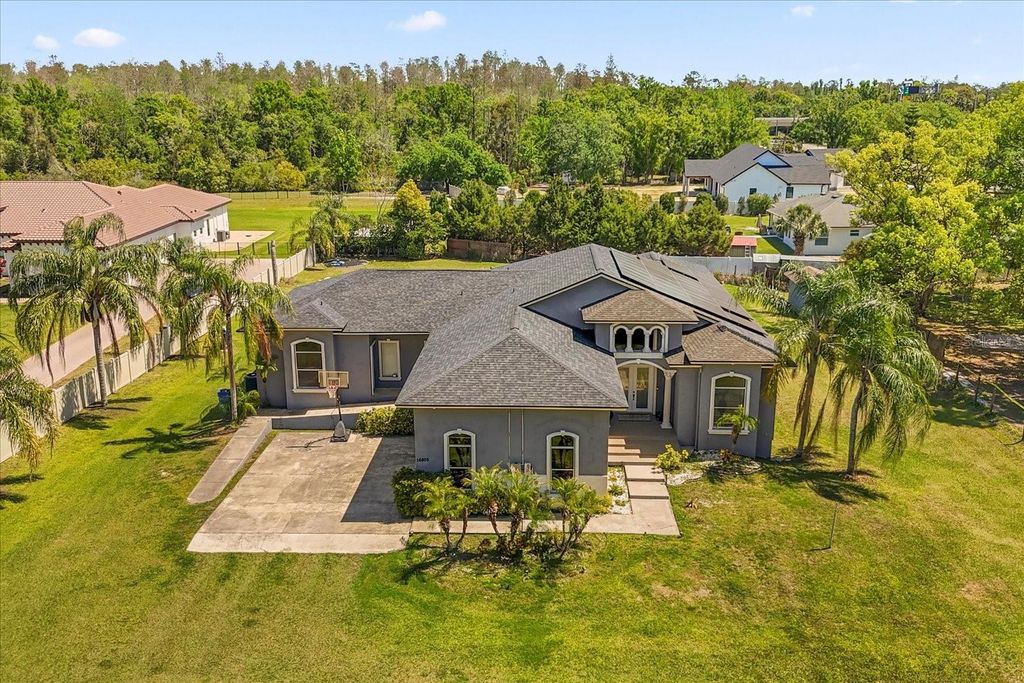 Photo of 16805 Tobacco Road, Lutz, FL 33558 (MLS # O6297899)