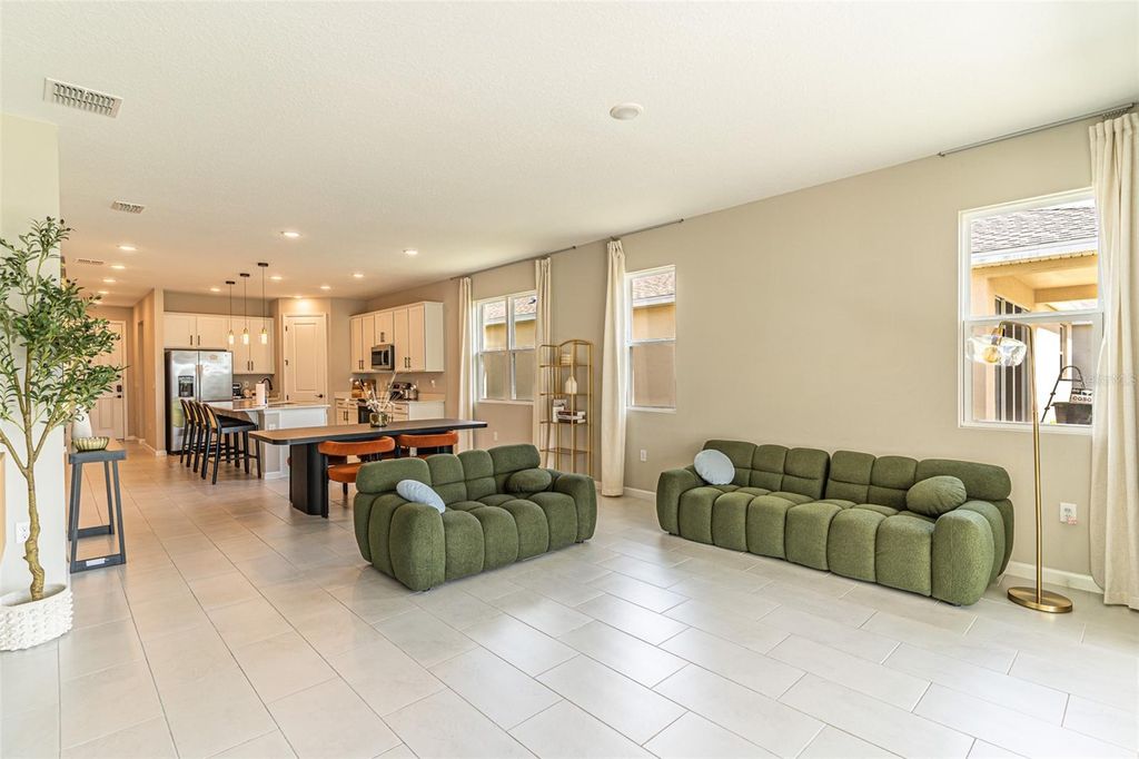 Photo of 148 Hilltop Bloom Loop, Haines City, FL 33844 (MLS # L4960976)