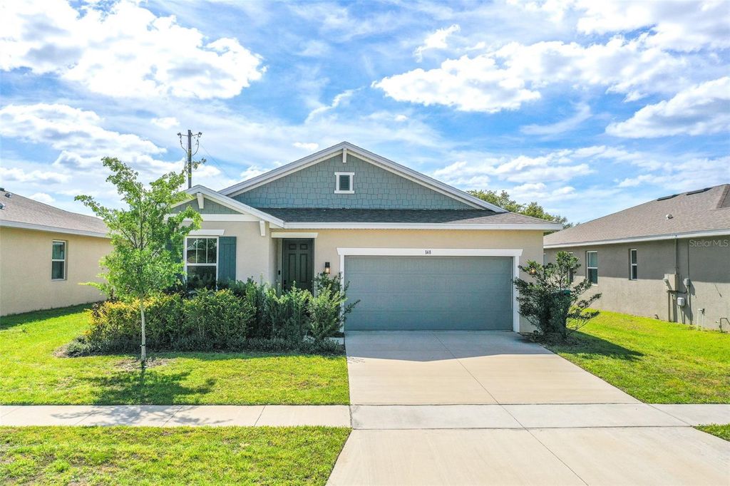 Photo of 148 Hilltop Bloom Loop, Haines City, FL 33844 (MLS # L4960976)