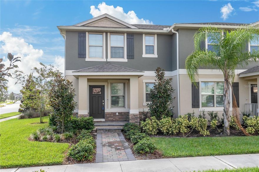 Welcome to this beautiful 3-bedroom, 2.5-bath townhome with a 1-car garage located in the highly sought-after Waterleigh community in Winter Garden. This popular Sandhill floor plan offers a premium corner location with partial water views from the upstairs primary suite and a thoughtfully designed open layout perfect for comfortable everyday living.The spacious kitchen is fully equipped with upgraded stainless-steel appliances, granite countertops, and a café-style island that opens to the dining and family room, creating a seamless flow for entertaining. A convenient half bath is located on the first floor for guests. Upstairs, enjoy a versatile loft area ideal for a home office, study space, or media/play room. The private owner’s suite features a walk-in closet, dual sinks with granite countertops, and a large walk-in shower. Two additional guest bedrooms share a full bath with granite counters and a shower/tub combo. Washer and dryer are included in the separate upstairs laundry closet. Outdoor living is just as inviting with a covered front porch and a covered lanai in the rear featuring a beautiful paved deck and extended driveway. Residents of Waterleigh enjoy resort-style amenities including a clubhouse with beach-entry pool, fitness center, playground, dog park, and scenic walking trails. Conveniently located near top-rated schools, medical facilities, shopping, dining, and major roadways. Experience the lifestyle Waterleigh has to offer — schedule your private showing today!