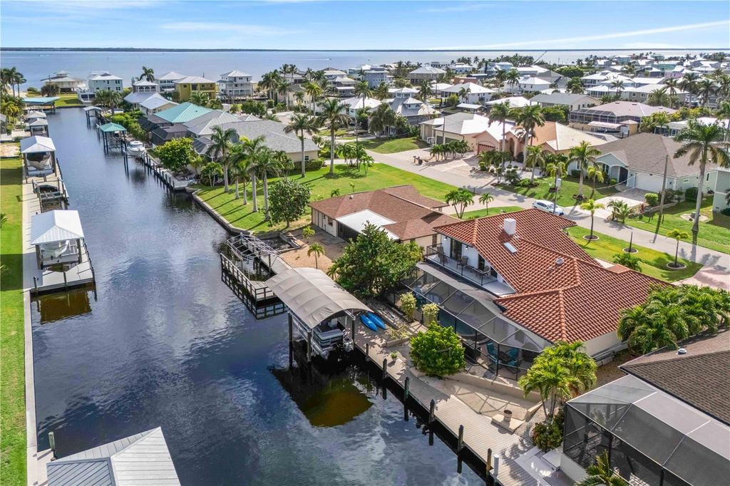 Photo of 2420 Cherimoya Lane, St James City, FL 33956 (MLS # A4677557)