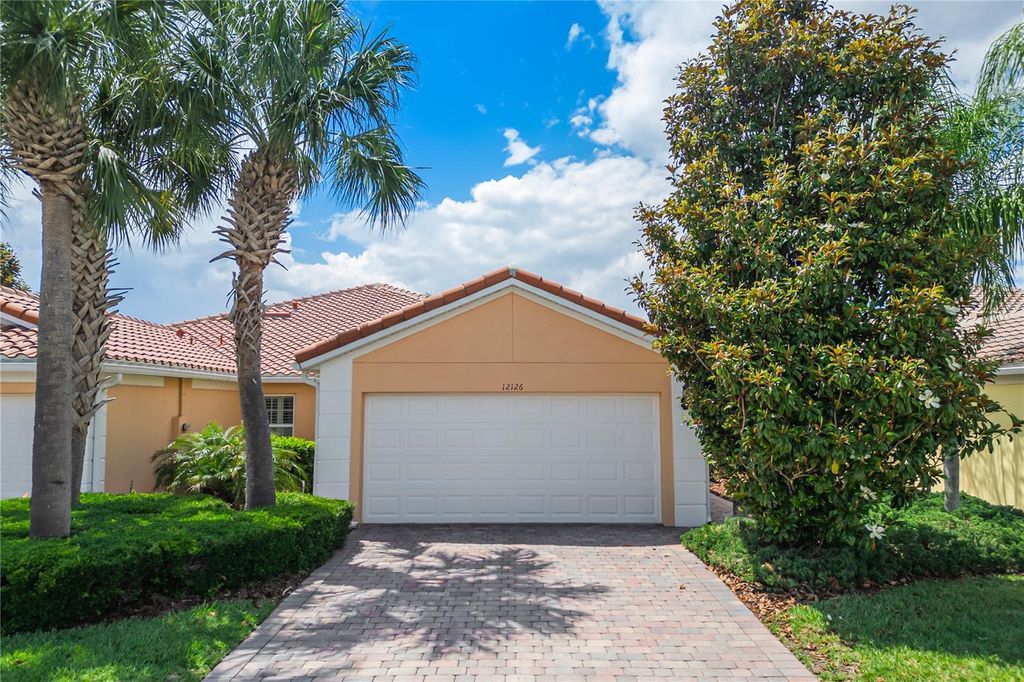 Photo of 12126 Tripletail Lane, Orlando, FL 32827 (MLS # O6407450)