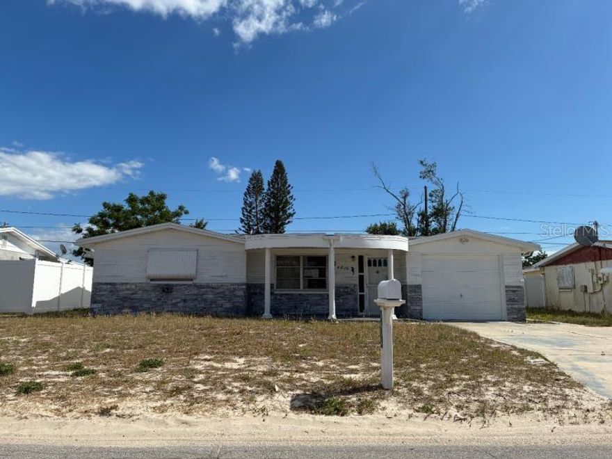 Great Starter or Investor Home with 2 Bedroom 1 Bathrooms 1 Car Garage NO HOA and a Fenced Backyard Located in the Crest Ridge Gardens Neighborhood. Home has tons of upside with some finishing touches needed. Kitchen has plenty of cabinet and countertop space. Home also has plenty of storage and a bonus room which can be used as an office or playroom. Exterior covered/screened in patio offers a great space to relax while the fenced backyard is perfect for a cookout or the pets to play. The location is close to everything including Tarpon Springs, Sponge Docks, Anclote Park, shopping, restaurants, grocery, entertainment, schools, US Hwy 19 and the beaches! Please call to schedule a showing today!