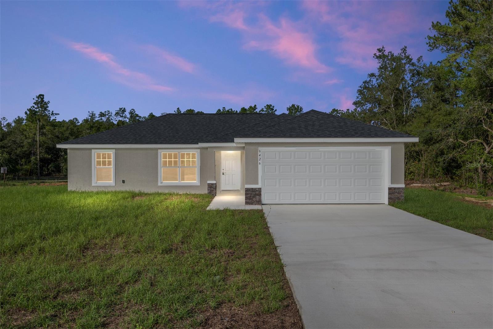 One or more photo(s) has been virtually staged. One or more photo(s) has been virtually staged. This GORGEOUS brand-new home located in Citrus Springs is the ideal escape from the hustle and bustle of city life! With an open floor plan, pleasing neutral colors and vinyl plank flooring throughout, this 3-bedroom 2 bathroom residence has all the charm and comfort any family could desire. Showcasing shaker style cabinets with granite counter tops in the kitchen, a washer/dryer hook up in the inside laundry for your added convenience. Plus a stainless-steel appliance package, this home is sure to impress! Enjoy your time in the neighborhood while nearby shopping, dining, medical centers and natural springs keeps life exciting. Its location near pristine rivers and natural springs allows for outdoor activities wherever adventure finds you!!