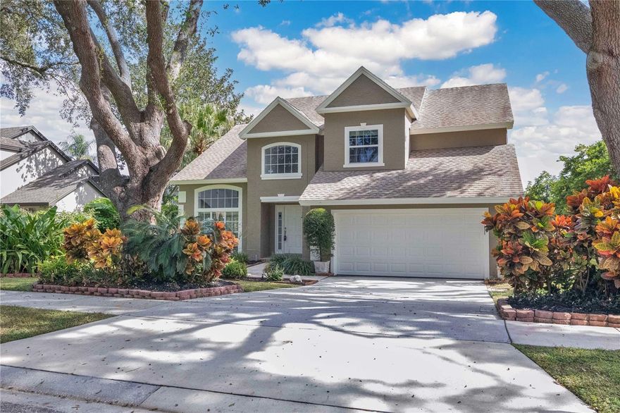 Nestled in the desirable Ridgemoore community of Orlando, this beautifully updated 4-bedroom, 2-bath pool home offers a perfect balance of comfort, style, and everyday livability. Freshly painted inside and out, the home welcomes you with high ceilings, abundant natural light, and open spaces that flow effortlessly from room to room. Large windows frame peaceful sunrise views over the sparkling backyard pool, setting the tone for quiet mornings and relaxed evenings outdoors. The first-floor primary suite provides privacy and convenience with direct access to the lanai, while three additional bedrooms upstairs offer flexible space for family, guests, or a home office. The open-concept kitchen, living, and dining areas are ideal for both entertaining and daily life, designed to bring people together while still feeling spacious and inviting. Step outside to your private screened-in pool and patio—perfect for outdoor dining, lounging, or simply enjoying the tranquil setting. Tucked along a quiet, tree-lined street with manicured landscaping, this home embodies the best of Florida living: bright, comfortable, and close to top-rated schools, shopping, dining, and commuter routes. Every element of this Ridgemoore residence reflects thoughtful care, timeless design, and a welcoming sense of home.
