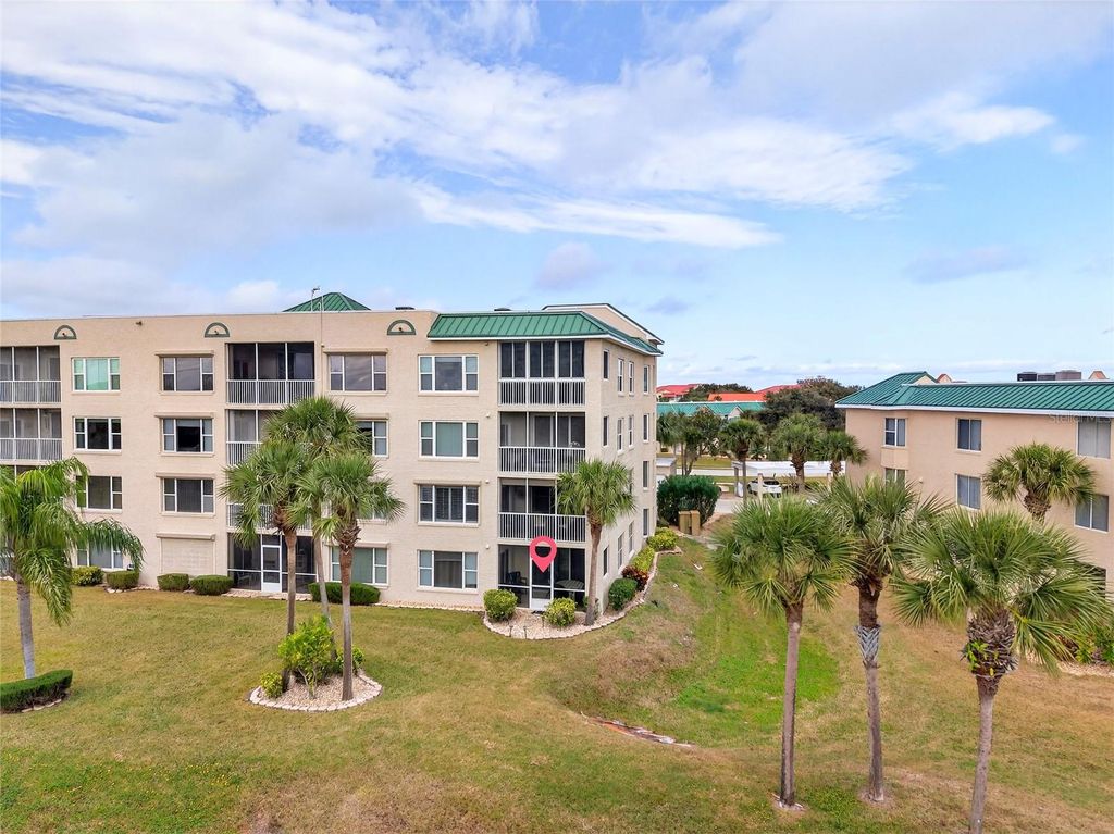 Photo of 420 Bouchelle Drive #101, New Smyrna Beach, FL 32169 (MLS # OM716466)